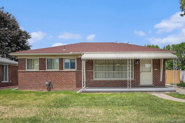 5239 E 13 Mile Rd, Warren, MI 48092 - back of property with brick siding and a shingled roof