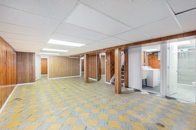 5239 E 13 Mile Rd, Warren, MI 48092 - finished basement featuring washer / dryer, wood walls, a drop ceiling, stairway, and baseboards