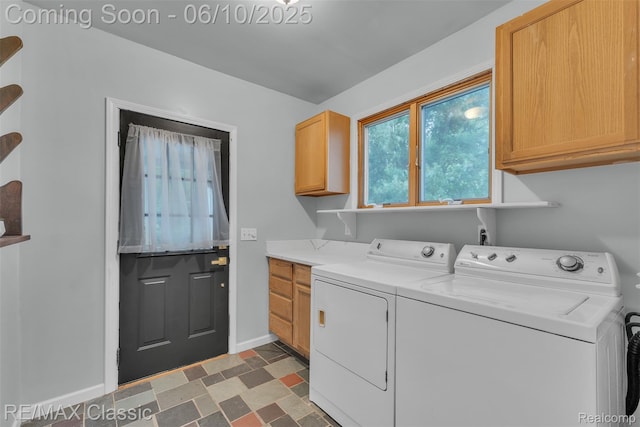 917 Middle Rd, Highland, MI 48357 - laundry area featuring cabinet space, separate washer and dryer, and baseboards