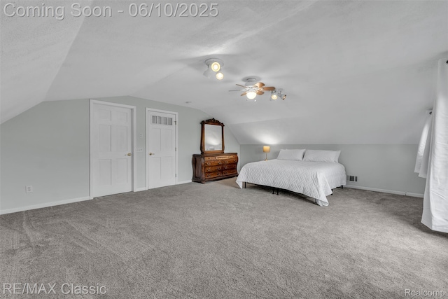 917 Middle Rd, Highland, MI 48357 - bedroom featuring lofted ceiling, carpet floors, a ceiling fan, and baseboards