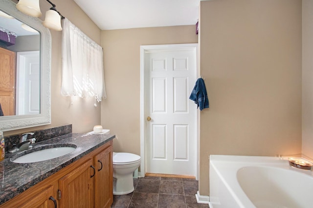 1417 Greenhouse Rd, Bangor, MI 49013 - full bathroom with a bath, vanity, toilet, and baseboards