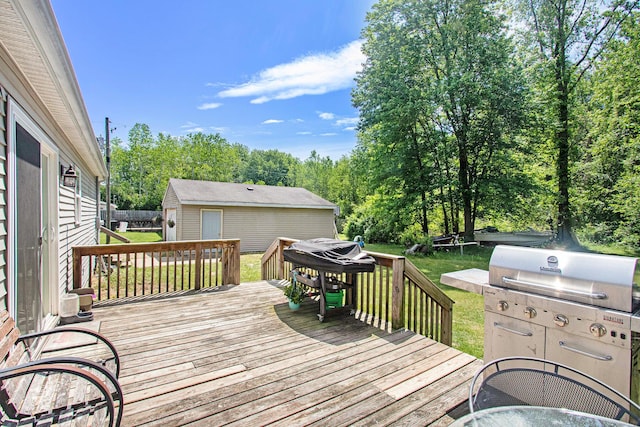 1417 Greenhouse Rd, Bangor, MI 49013 - deck with a yard, grilling area, and an outbuilding