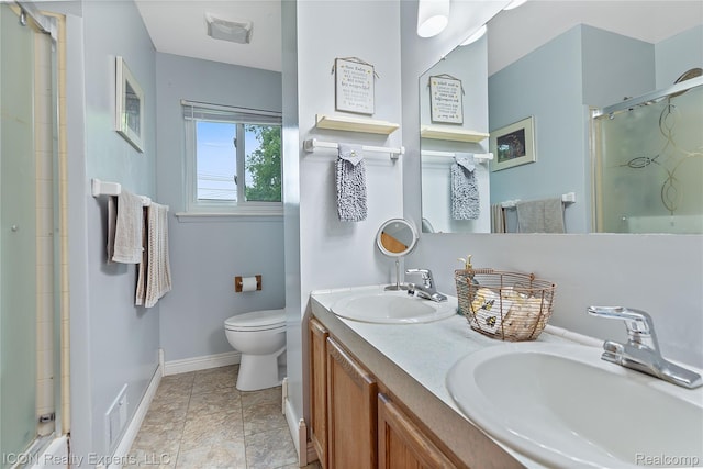 38505 Littlefield Dr, Sterling Heights, MI 48312 - full bathroom with baseboards, toilet, and double vanity