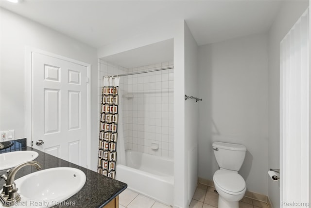 2430 Fox Hill Dr, Sterling Heights, MI 48310 - bathroom featuring toilet, tile patterned floors, shower / bathtub combination with curtain, double vanity, and baseboards