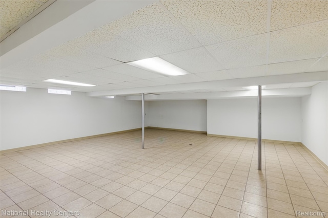 2430 Fox Hill Dr, Sterling Heights, MI 48310 - basement with a drop ceiling and baseboards