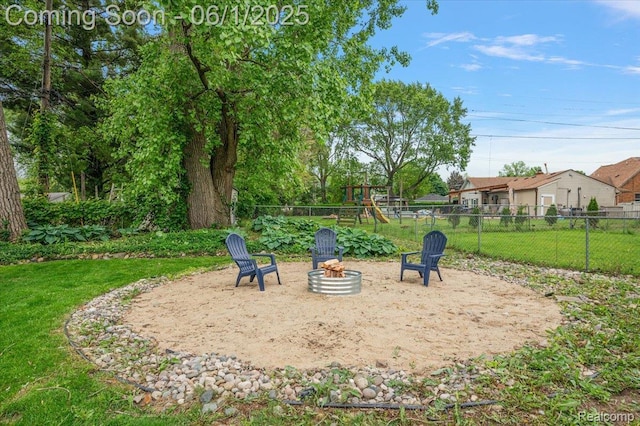 22923 Madison St, Dearborn, MI 48124 - view of home's community featuring a playground and an outdoor fire pit