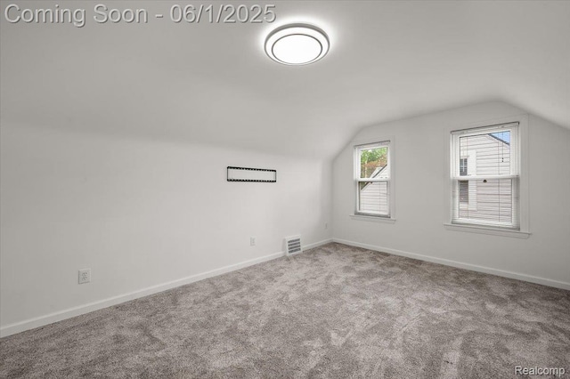 22923 Madison St, Dearborn, MI 48124 - additional living space featuring lofted ceiling, baseboards, and carpet