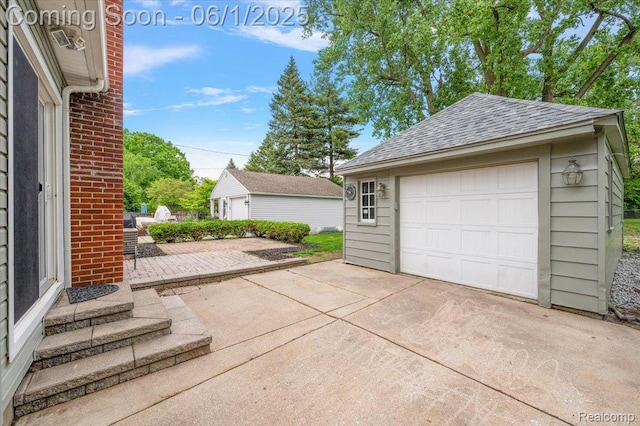 22923 Madison St, Dearborn, MI 48124 - detached garage featuring driveway
