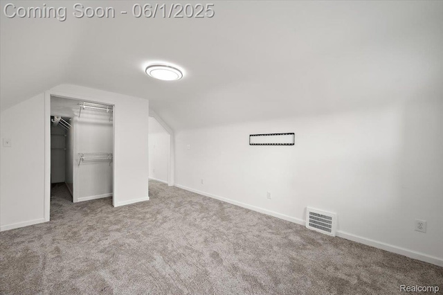22923 Madison St, Dearborn, MI 48124 - additional living space with lofted ceiling, carpet, and baseboards