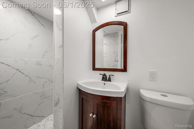 22923 Madison St, Dearborn, MI 48124 - full bathroom with vanity, toilet, and a marble finish shower