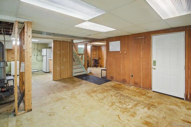 4811 Briarwood Ave, Royal Oak, MI 48073 - finished basement featuring freestanding refrigerator, stairs, a drop ceiling, washer / dryer, and wood walls
