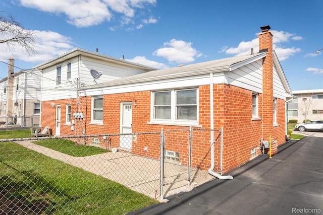 4811 Briarwood Ave, Royal Oak, MI 48073 - view of front of house featuring brick siding and a chimney