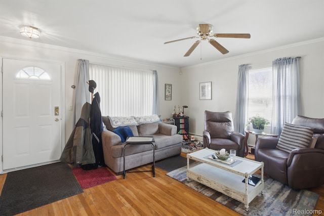 4811 Briarwood Ave, Royal Oak, MI 48073 - living area featuring light wood-style flooring, crown molding, and a ceiling fan