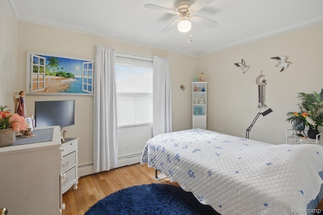 4811 Briarwood Ave, Royal Oak, MI 48073 - bedroom with light wood-type flooring, ornamental molding, a ceiling fan, a baseboard radiator, and a baseboard heating unit