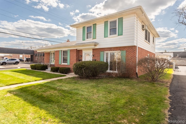4811 Briarwood Ave, Royal Oak, MI 48073 - traditional-style house with brick siding and a front lawn