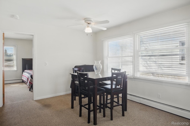 4811 Briarwood Ave, Royal Oak, MI 48073 - carpeted dining room with baseboard heating, a ceiling fan, and baseboards