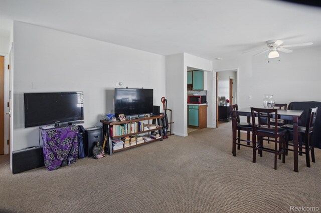 4811 Briarwood Ave, Royal Oak, MI 48073 - dining area featuring carpet floors and a ceiling fan