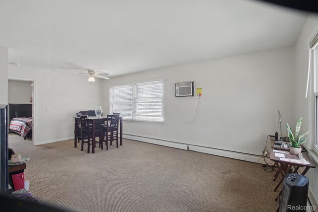 4811 Briarwood Ave, Royal Oak, MI 48073 - dining room with a baseboard radiator, carpet floors, a ceiling fan, an AC wall unit, and baseboards