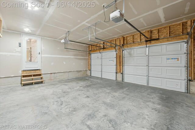 5200 Autumn Kirsten Dr, Fowlerville, MI 48836 - garage with a garage door opener