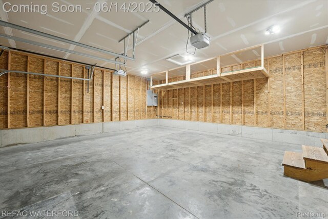 5200 Autumn Kirsten Dr, Fowlerville, MI 48836 - garage featuring a garage door opener