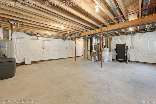5200 Autumn Kirsten Dr, Fowlerville, MI 48836 - unfinished basement featuring water heater and heating unit
