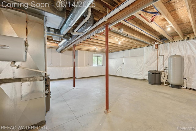 5200 Autumn Kirsten Dr, Fowlerville, MI 48836 - below grade area with a water pressure tank