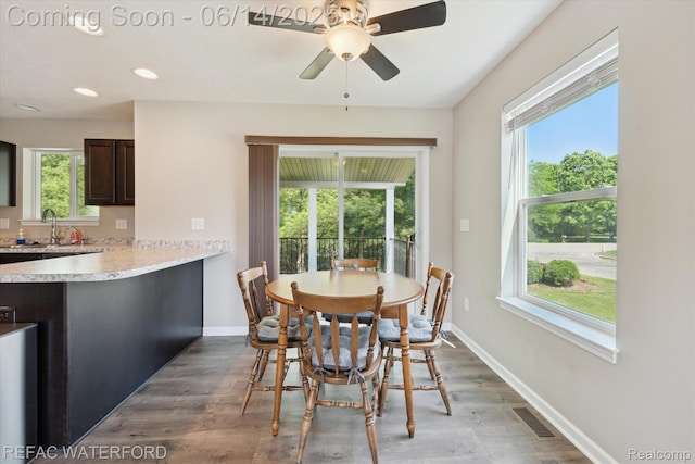 5200 Autumn Kirsten Dr, Fowlerville, MI 48836 - dining room with light wood-style floors, ceiling fan, and recessed lighting