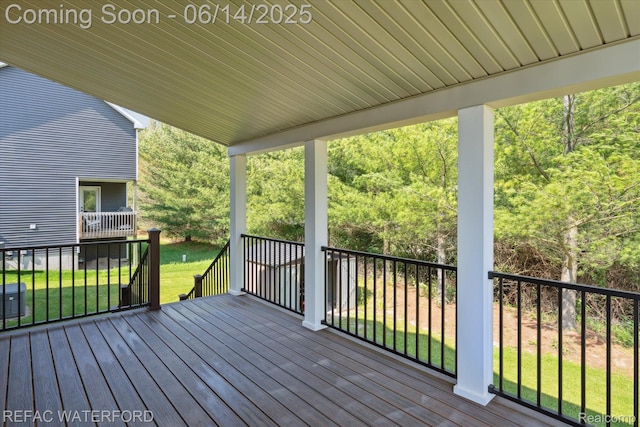 5200 Autumn Kirsten Dr, Fowlerville, MI 48836 - deck featuring a lawn