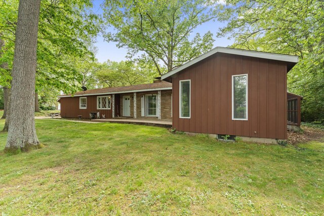 2240 S 13th St, Niles, MI 49120 - back of house featuring a yard
