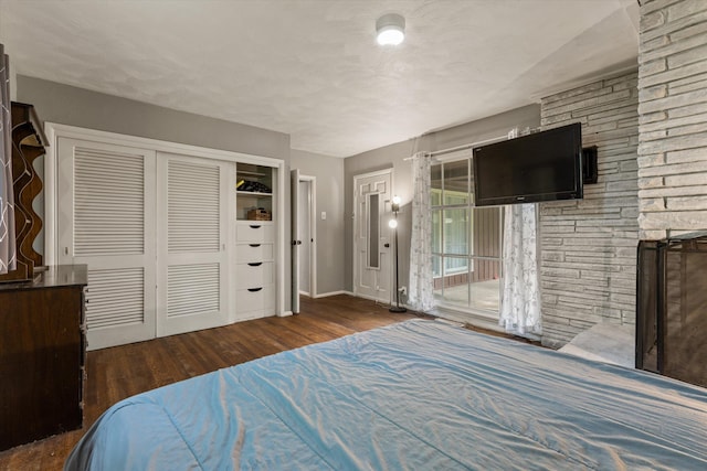 2240 S 13th St, Niles, MI 49120 - bedroom with wood finished floors and a fireplace