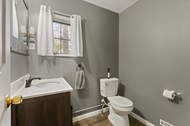 2240 S 13th St, Niles, MI 49120 - half bathroom with vanity and wood finished floors