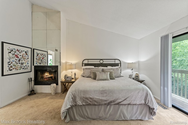 4355 Middleton Dr, Bloomfield Hills, MI 48302 - carpeted bedroom with lofted ceiling, a warm lit fireplace, baseboards, and access to exterior