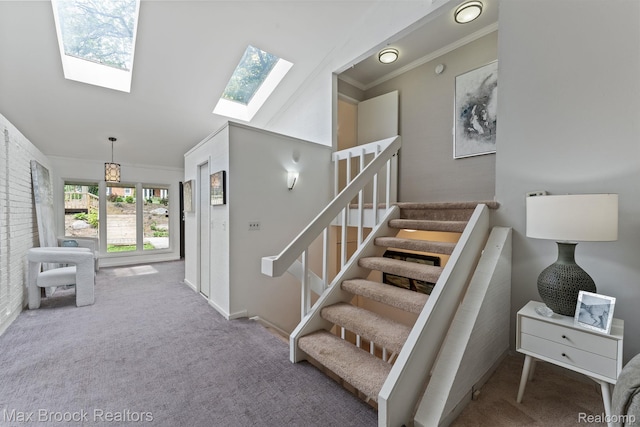 4355 Middleton Dr, Bloomfield Hills, MI 48302 - stairway featuring a skylight, carpet flooring, crown molding, baseboards, and lofted ceiling