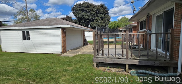 26312 Warrington St, Dearborn Heights, MI 48127 - wooden terrace with a trampoline, an outdoor structure, a garage, and a lawn