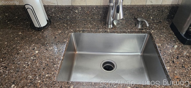 26312 Warrington St, Dearborn Heights, MI 48127 - kitchen view of a sink and dark countertops