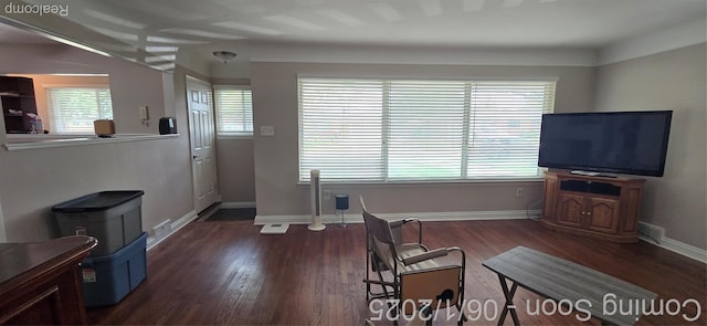 26312 Warrington St, Dearborn Heights, MI 48127 - living room featuring dark wood-style flooring and baseboards