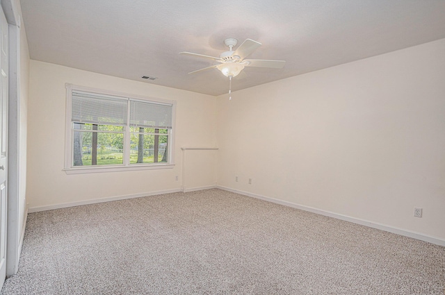 1407 S Dibble St, Hastings, MI 49058 - empty room featuring a ceiling fan, light carpet, and baseboards
