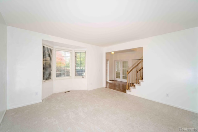 6169 Valley View Dr, Canton, MI 48187 - carpeted empty room with stairway