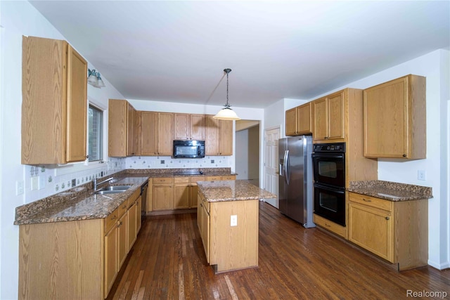 6169 Valley View Dr, Canton, MI 48187 - kitchen featuring black appliances, a sink, dark stone countertops, dark wood-type flooring, and a center island