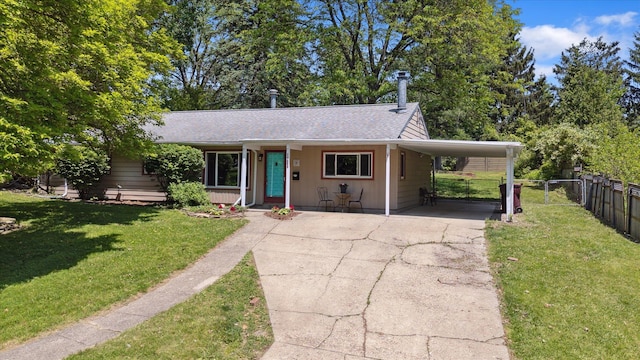 1204 Bydding Rd, Ann Arbor, MI 48103 - view of front facade featuring a carport, concrete driveway, roof with shingles, and a porch
