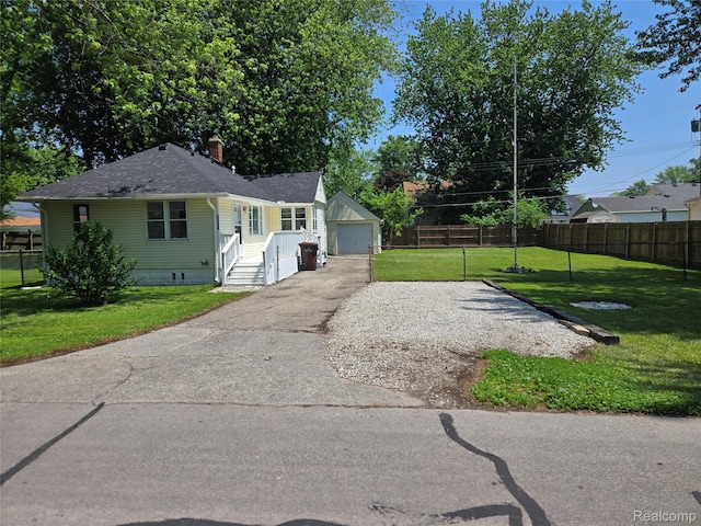 3263 Beechwood St, Monroe, MI 48162 - view of front of house with a garage, a shingled roof, a chimney, and an outdoor structure