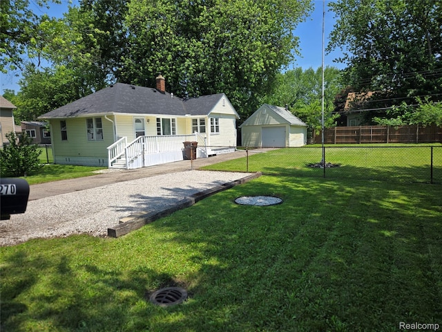 3263 Beechwood St, Monroe, MI 48162 - view of front of property featuring a garage, a chimney, a shingled roof, and an outbuilding