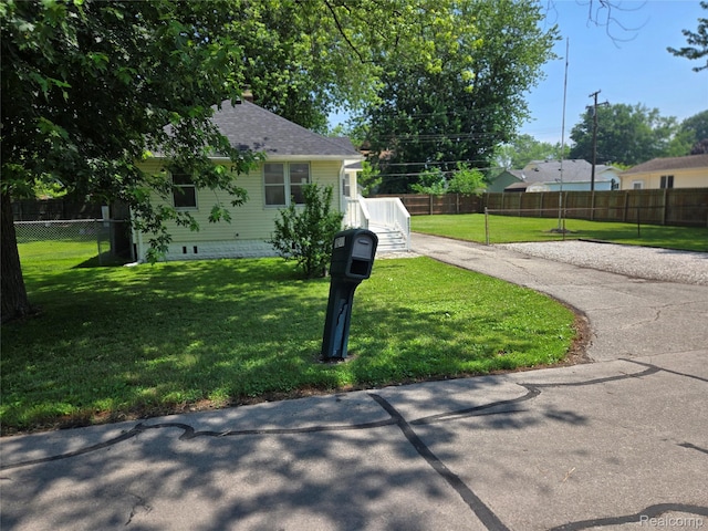 3263 Beechwood St, Monroe, MI 48162 - view of front of property featuring a shingled roof and driveway