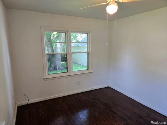 3263 Beechwood St, Monroe, MI 48162 - empty room with ceiling fan and dark wood finished floors