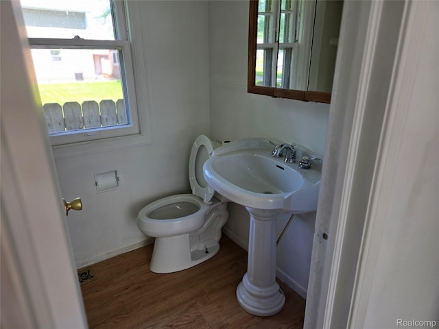 3263 Beechwood St, Monroe, MI 48162 - bathroom featuring toilet and wood finished floors
