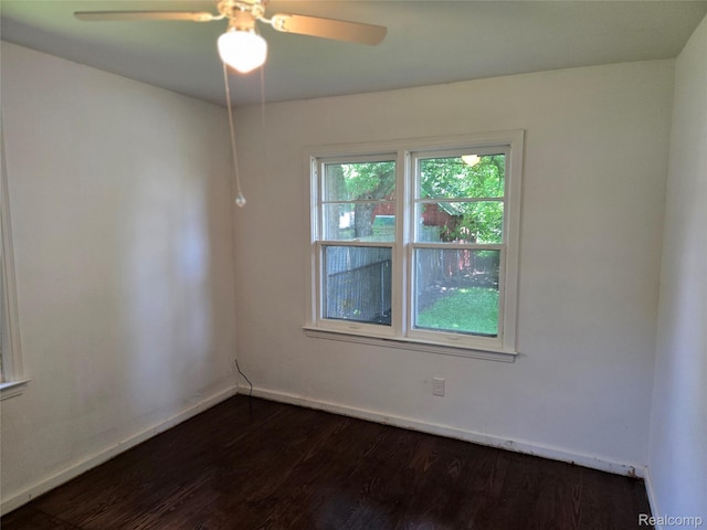 3263 Beechwood St, Monroe, MI 48162 - spare room featuring dark wood finished floors and ceiling fan