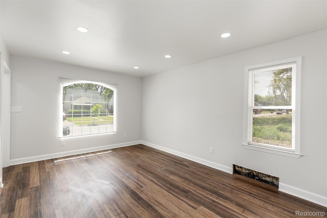 17877 Rowe St, Detroit, MI 48205 - spare room with recessed lighting, dark wood finished floors, and baseboards
