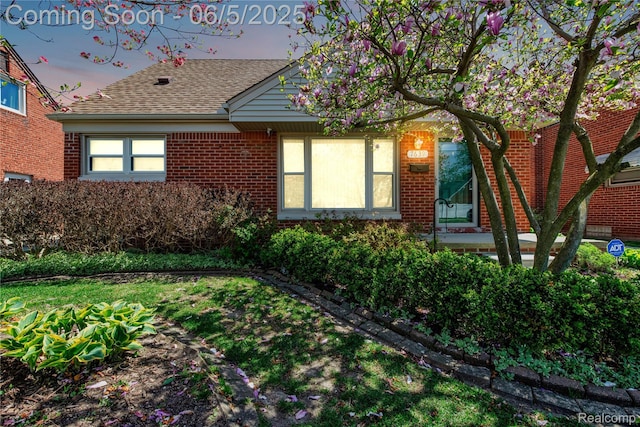 7639 Polk St, Taylor, MI 48180 - view of front of home with roof with shingles and brick siding