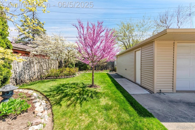 7639 Polk St, Taylor, MI 48180 - view of yard featuring a garage and an outbuilding