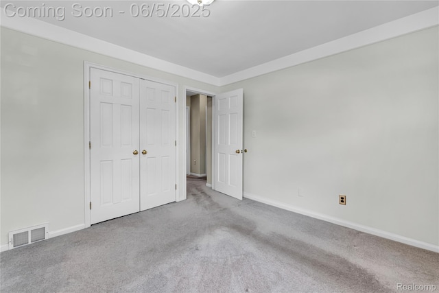 7639 Polk St, Taylor, MI 48180 - unfurnished bedroom featuring baseboards, carpet, and a closet